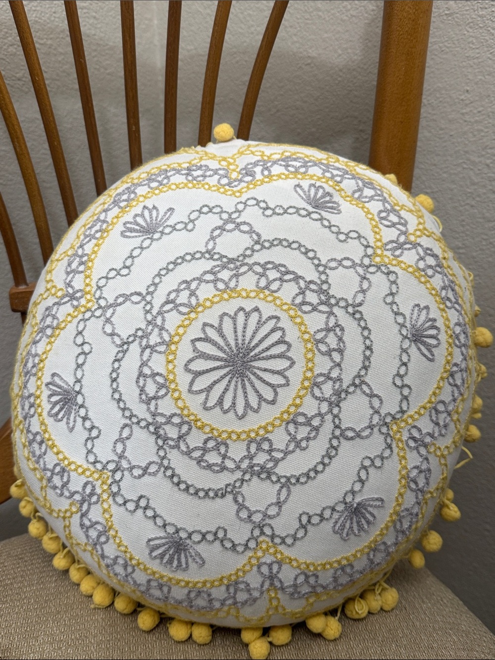Decorative Round Throw Pillow with Yellow and Gray Embroidery